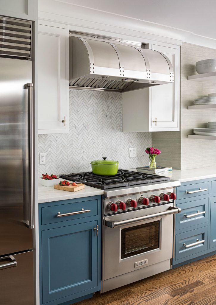 kitchen with white and blue cabinets